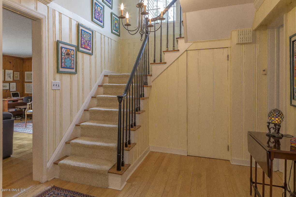 2 Boxwood Lane Greenwich, CT 06830 - Photo 7 of 23 a view of an entryway with staircase