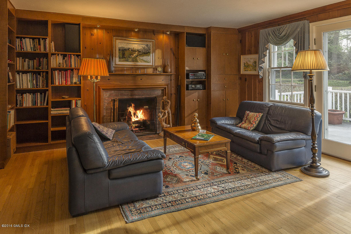 2 Boxwood Lane Greenwich, CT 06830 - Photo 9 of 23 a living room with furniture and a fireplace