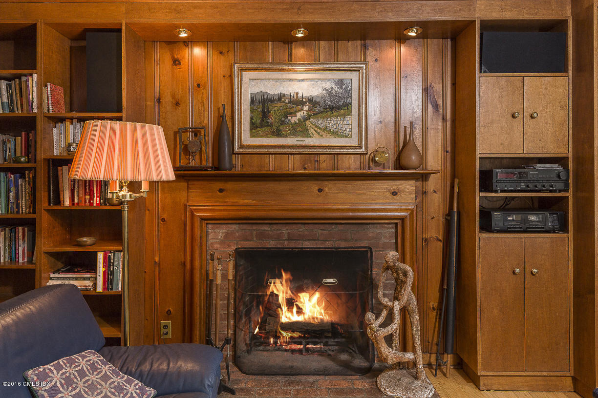 2 Boxwood Lane Greenwich, CT 06830 - Photo 10 of 23 a living room with furniture and a fireplace