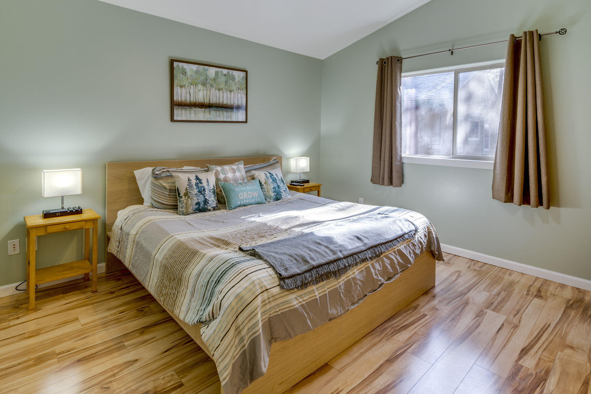 17285 Jacinto Road Bend, OR 97707 - Photo 16 of 47 a bedroom with a bed and a large window