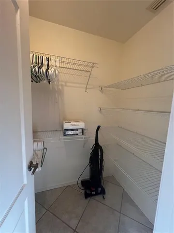 a view of a room with rack on the wall