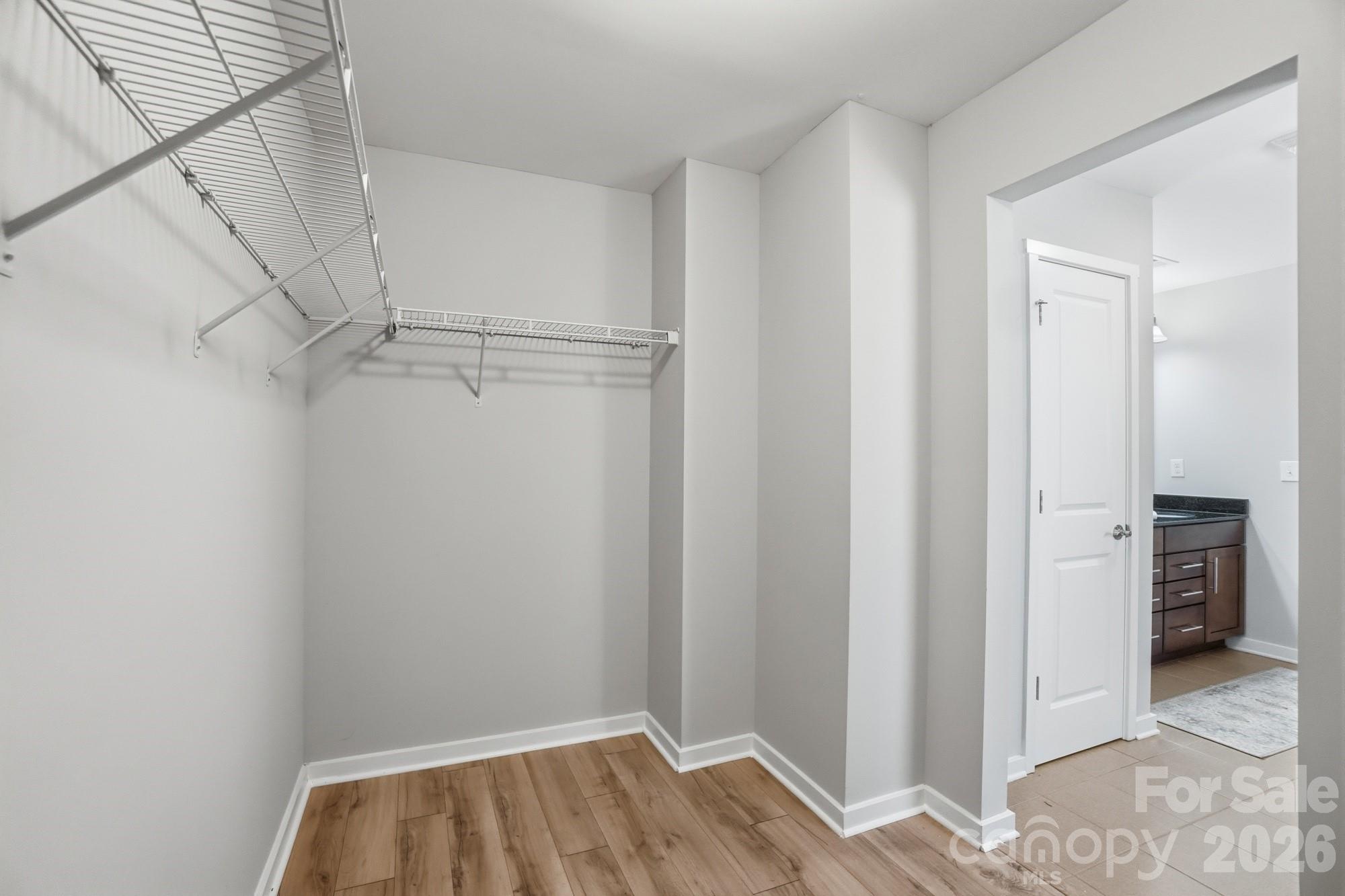 2153 Bluebell Way Tega Cay, SC 29708 - Photo 34 of 48 a view of bedroom with hallway and closet