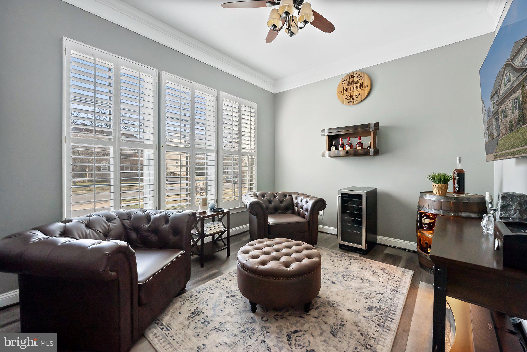 9061 Roaring Spring Loop Bristow, VA 20136 - Photo 17 of 55 a living room with furniture and a large window