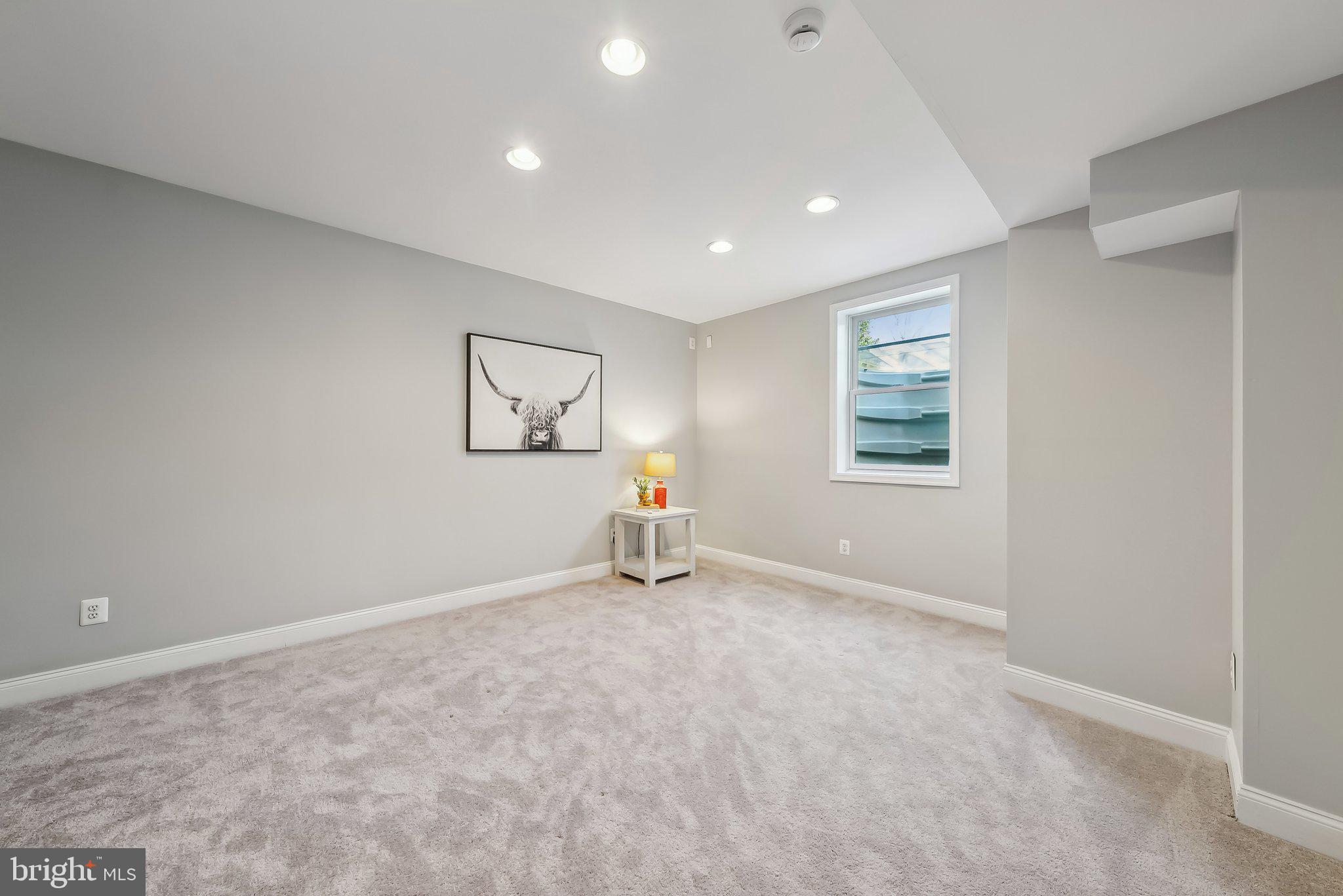 9061 Roaring Spring Loop Bristow, VA 20136 - Photo 24 of 55 a view of an empty room with a window