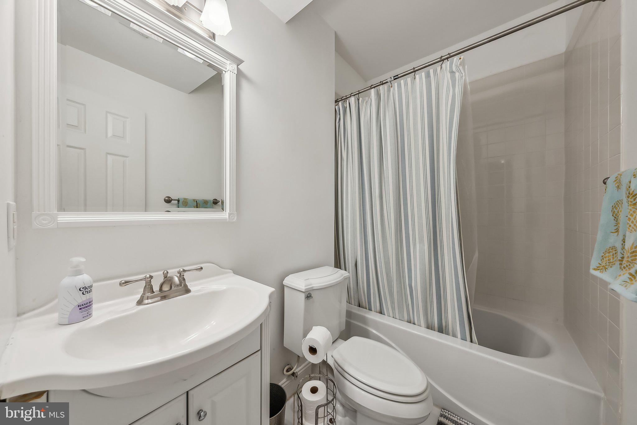 9061 Roaring Spring Loop Bristow, VA 20136 - Photo 26 of 55 a bathroom with a sink toilet and shower