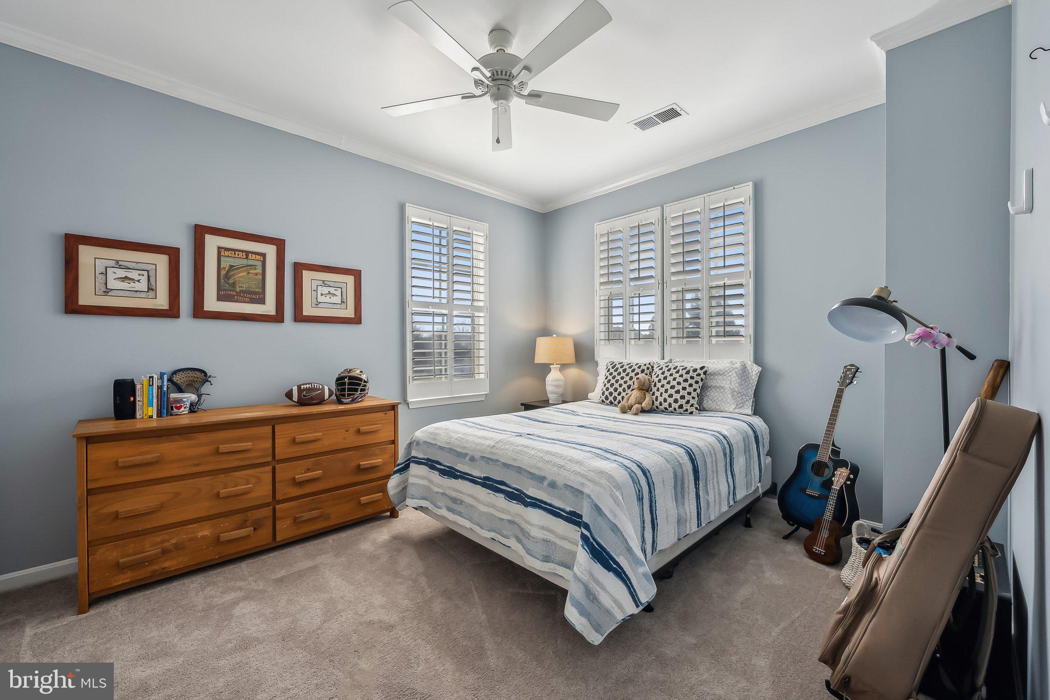 9061 Roaring Spring Loop Bristow, VA 20136 - Photo 41 of 55 a bedroom with bed and window