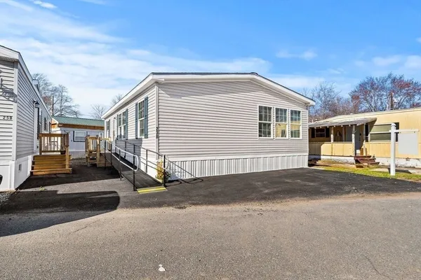 a front view of a house with a garage