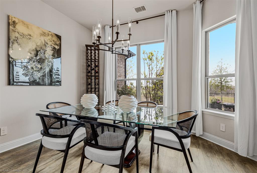 6513 Earley Way Forney, TX 75126 - Photo 14 of 36 a view of a dining room with furniture window and outside view