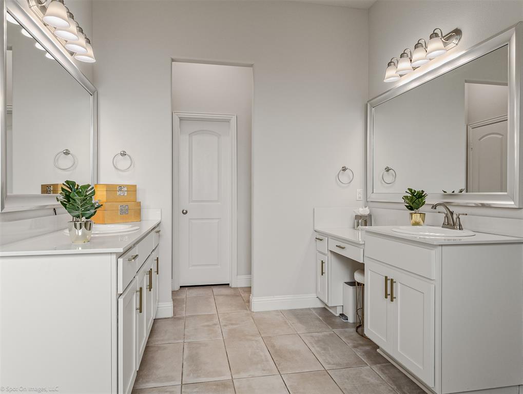 6513 Earley Way Forney, TX 75126 - Photo 16 of 36 a bathroom with a sink and a mirror