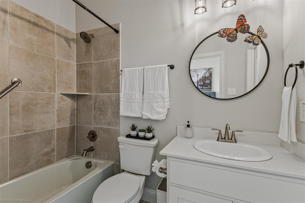 6513 Earley Way Forney, TX 75126 - Photo 29 of 36 a bathroom with a sink and a mirror