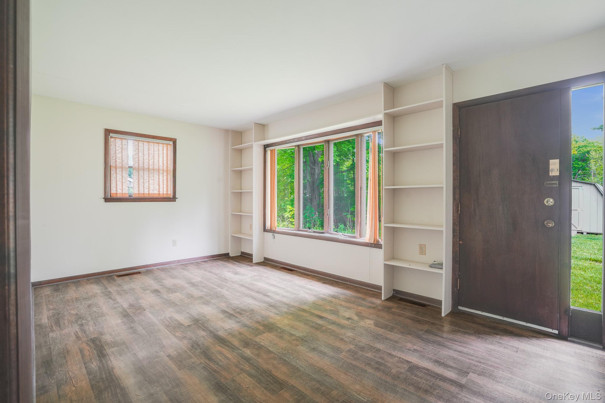 84 Sleight-Plass Road Poughkeepsie, NY 12603 - Photo 10 of 30 an empty room with windows