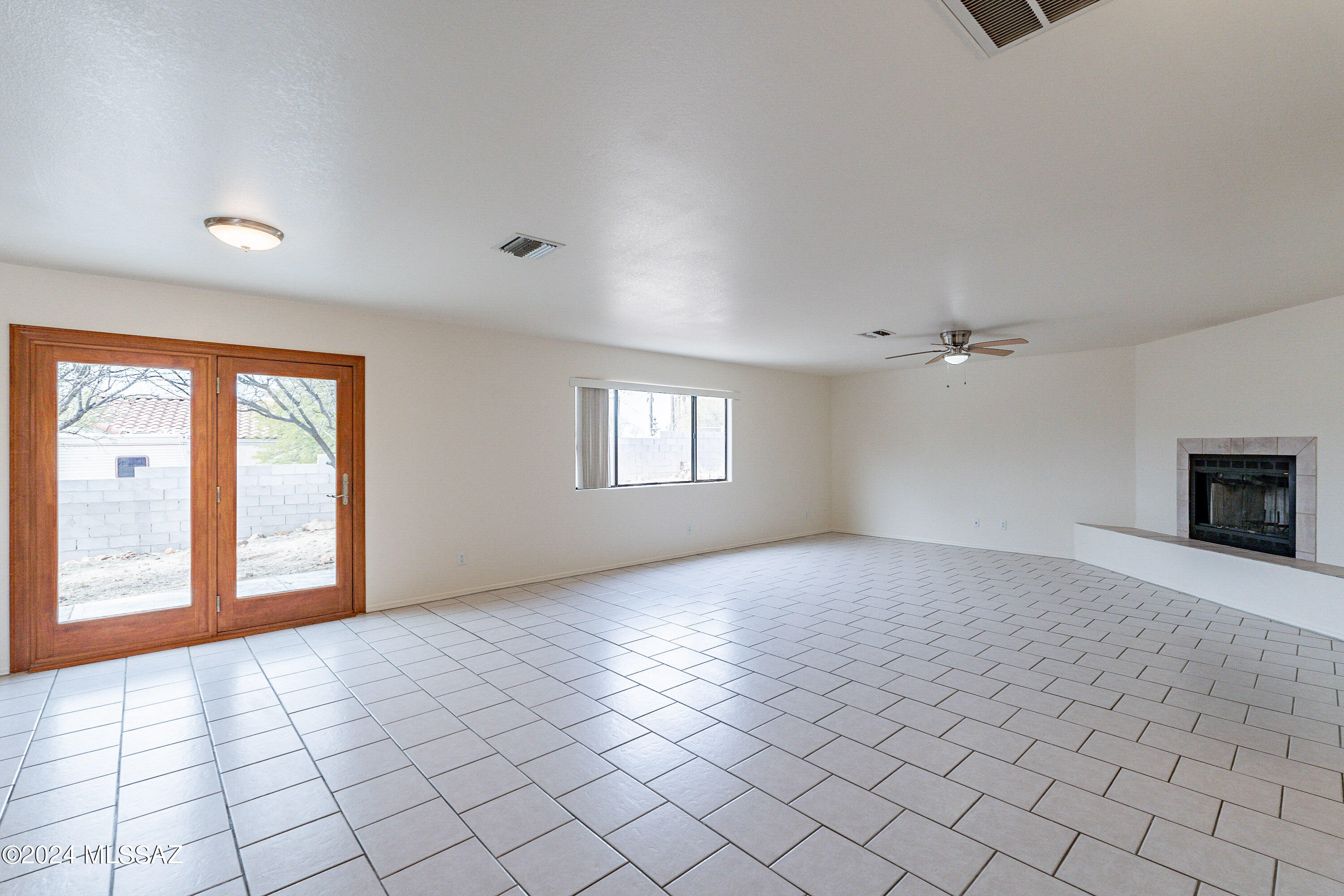 1380 Camino Faja Rio Rico, AZ 85648 - Photo 5 of 28 a view of an empty room and window