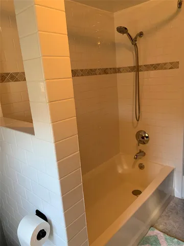 a bathroom with a bathtub