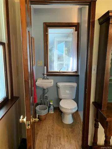 a bathroom with a toilet and a sink