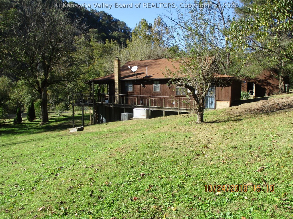 754 Little Italy Road Ivydale, WV 25113 - Photo 17 of 26 View from left side of the house. Whole house generator.