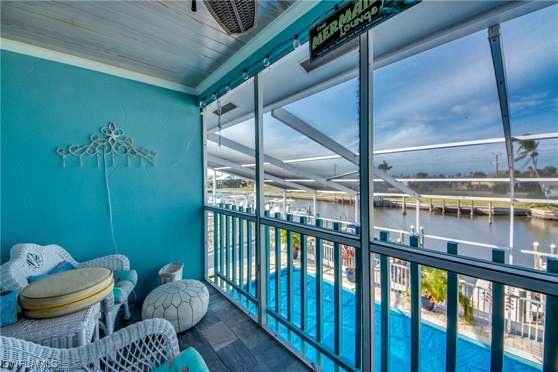 3215 Stringfellow Road, Unit 2D St. James City, FL 33956 - Photo 23 of 39 a view of a porch of the house