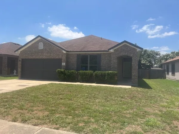 a view of pool with a yard