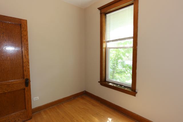 2312 West Iowa Street, Unit 1R Chicago, IL 60622 - Photo 18 of 20 a view of an empty room with a window