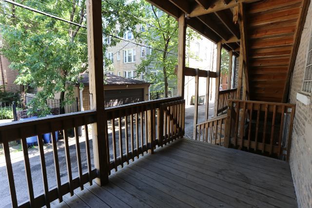 2312 West Iowa Street, Unit 1R Chicago, IL 60622 - Photo 20 of 20 a view of a balcony with wooden floor