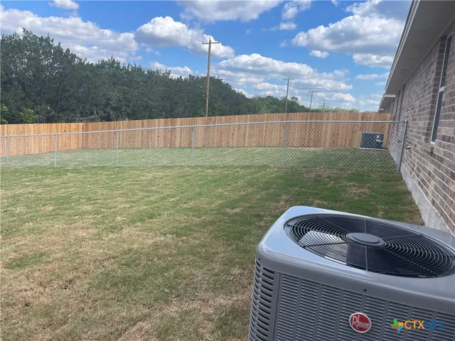 a view of outdoor space and yard