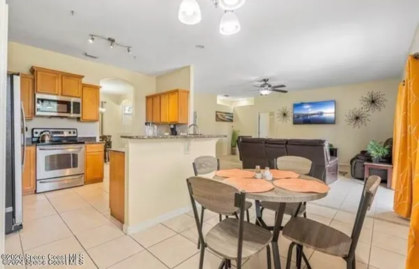 a view of a dining room with furniture