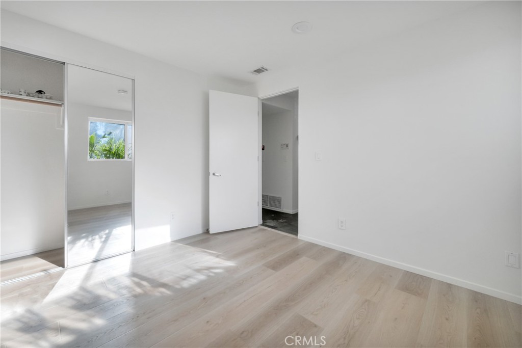514 Ardmore Avenue Hermosa Beach, CA 90254 - Photo 35 of 54 a view of an empty room with window and stairs