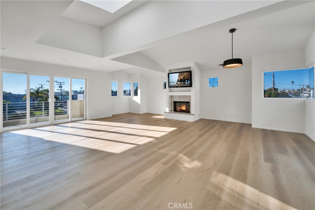 514 Ardmore Avenue Hermosa Beach, CA 90254 - Photo 8 of 54 a view of empty room with wooden floor and window