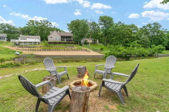 a view of an chairs and tables in the patio