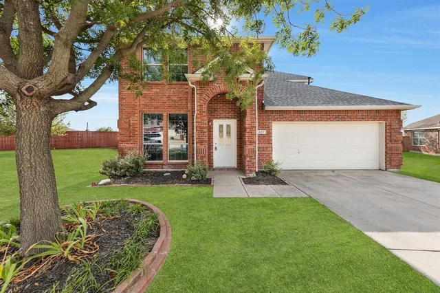 a front view of house with yard