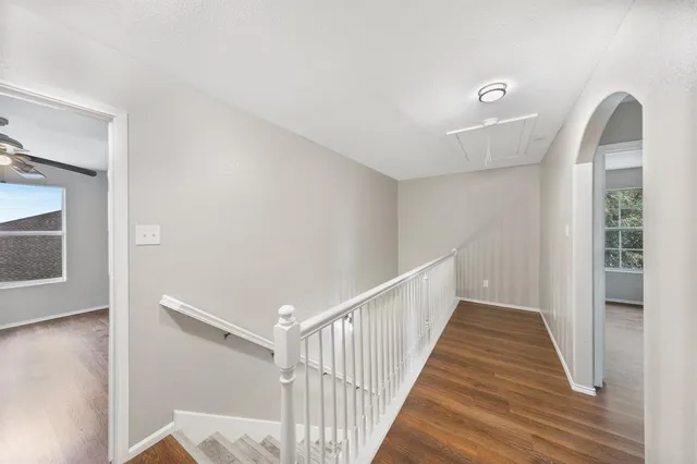 a view of a hallway view with staircase