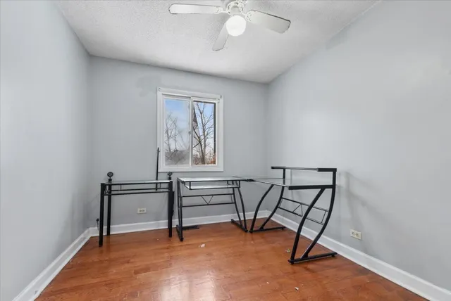 a view of a workspace with furniture