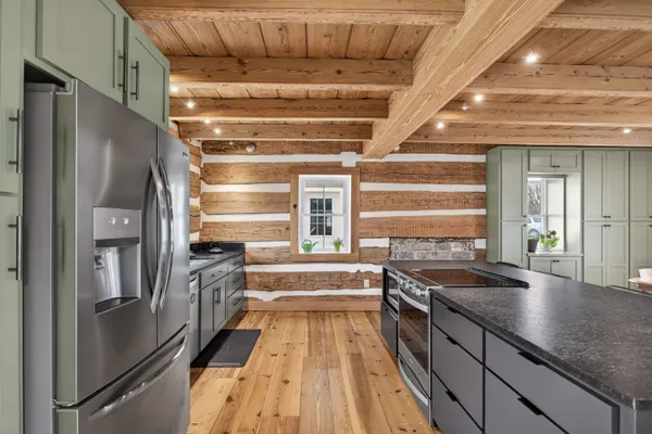 a view of entryway with wooden floor and a rug