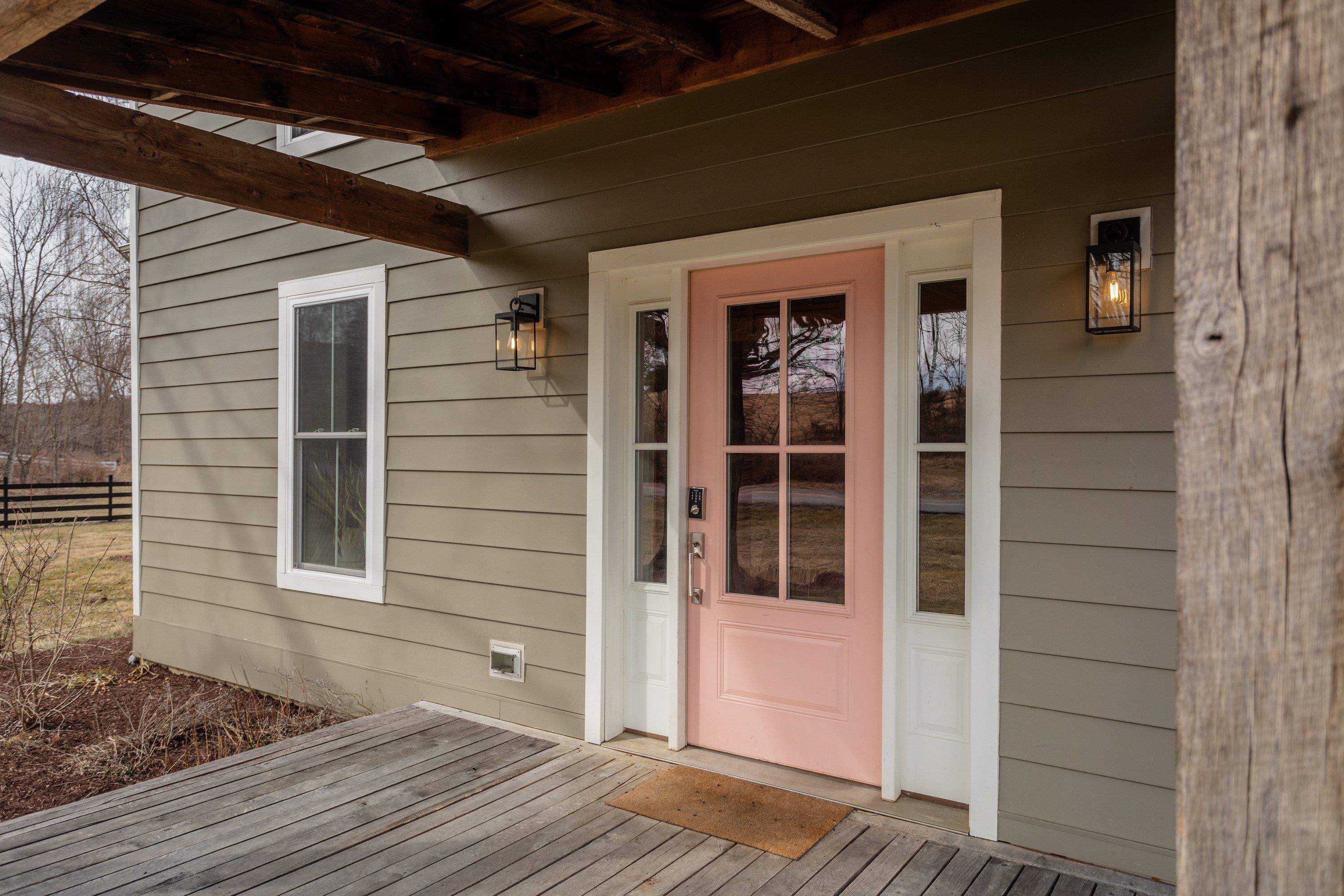 2862 Osceola Springs Road Harrisonburg, VA 22801 - Photo 2 of 75 This home offers a large front porch space overlooking the level front yard. This porch features a metal roof and large space for gathering with family and friends.