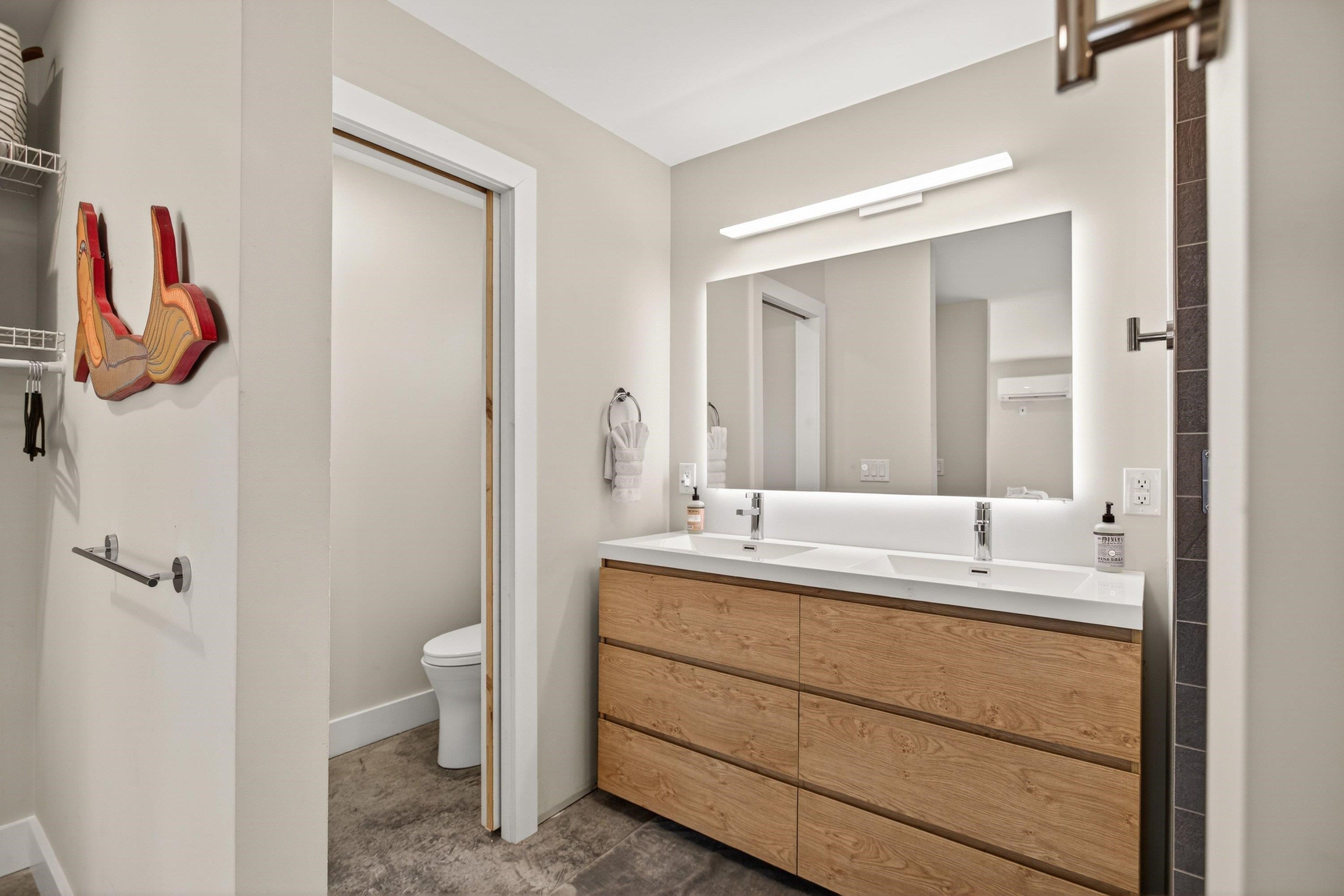2862 Osceola Springs Road Harrisonburg, VA 22801 - Photo 28 of 75 a bathroom with a double vanity sink and a mirror