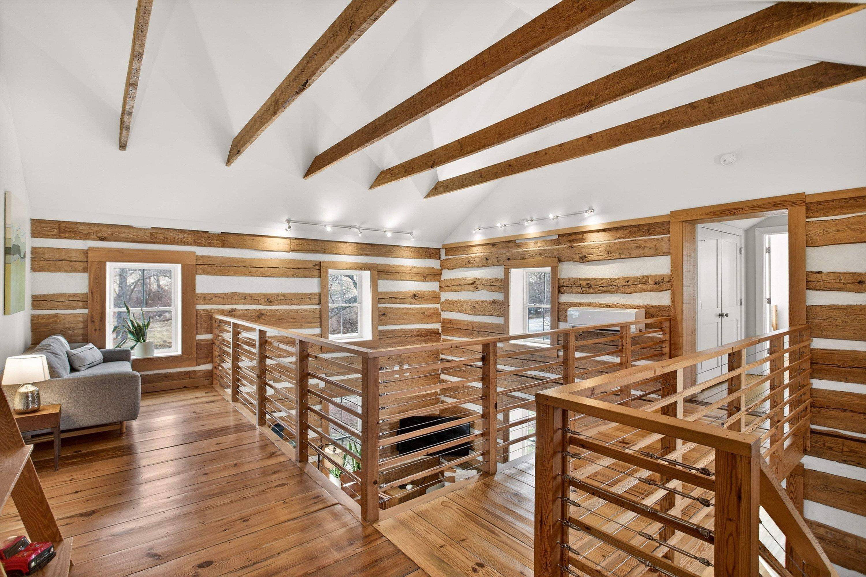 2862 Osceola Springs Road Harrisonburg, VA 22801 - Photo 32 of 75 At the top of the beautiful staircase is a loft space with space for a variety of uses! A play area, home office, and much more can be utilized in this space with windows and hardwood flooring throughout.