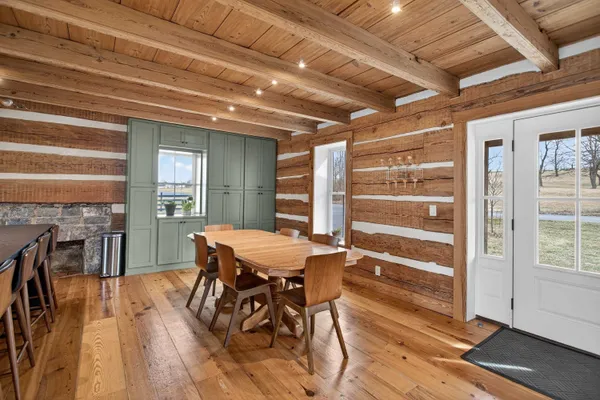 a bedroom with a bed and a fireplace