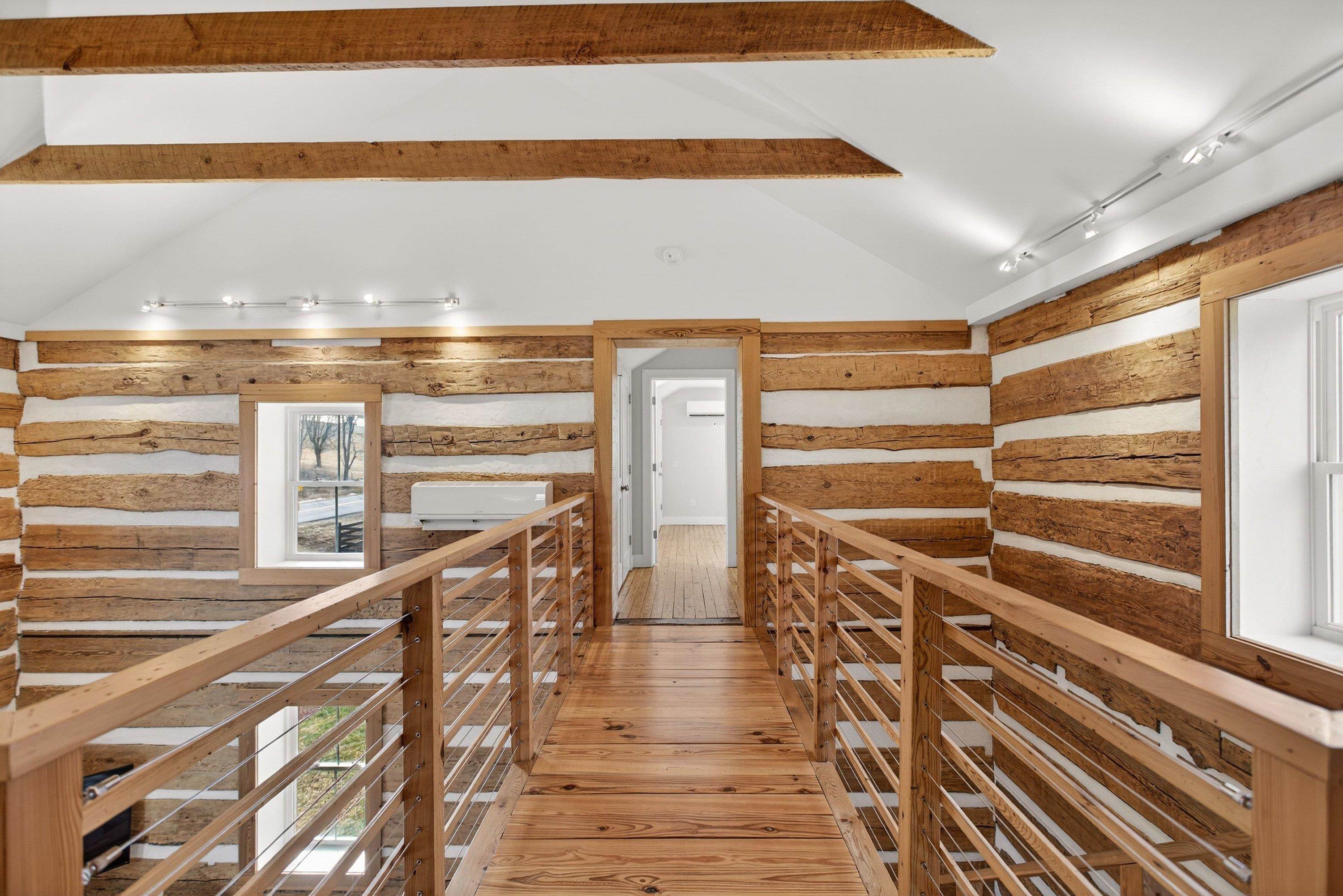 2862 Osceola Springs Road Harrisonburg, VA 22801 - Photo 43 of 75 At the top of the beautiful staircase is a loft space with space for a variety of uses! A play area, home office, and much more can be utilized in this space with windows and hardwood flooring throughout.