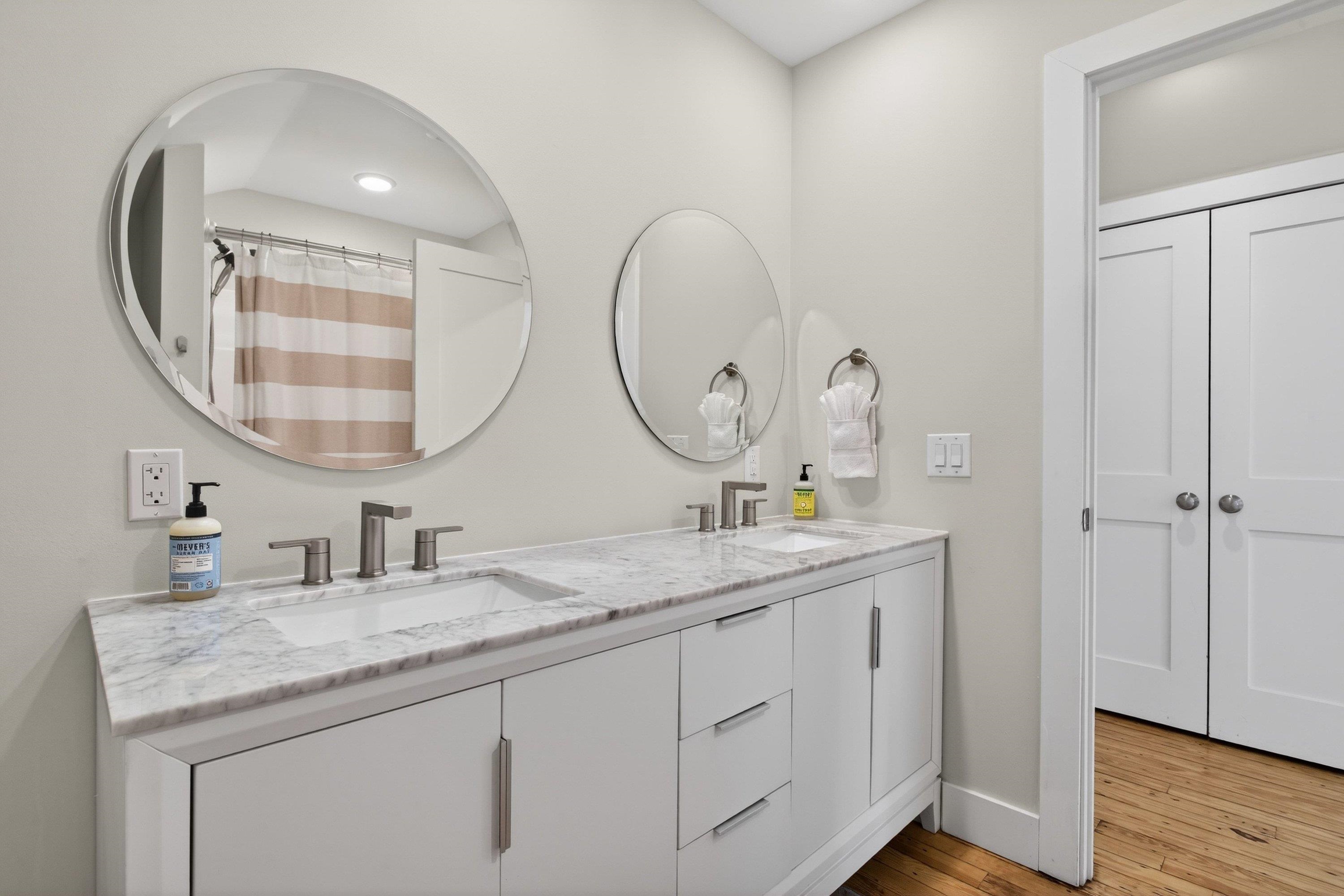 2862 Osceola Springs Road Harrisonburg, VA 22801 - Photo 44 of 75 a bathroom with a granite countertop double vanity sink and a mirror