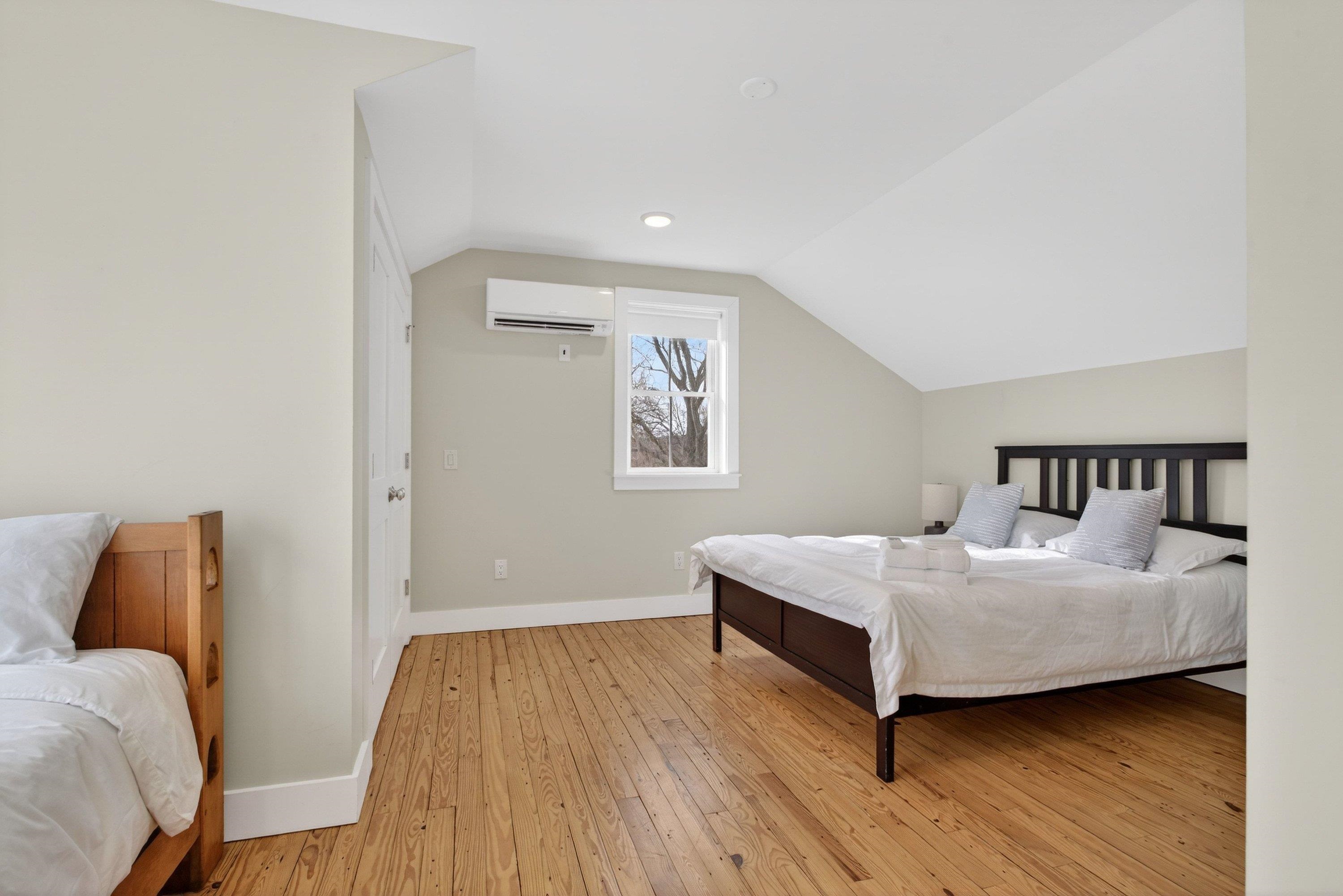 2862 Osceola Springs Road Harrisonburg, VA 22801 - Photo 45 of 75 a bedroom with a bed and a couch