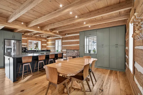 a view of a glass door with a potted plant on a counter
