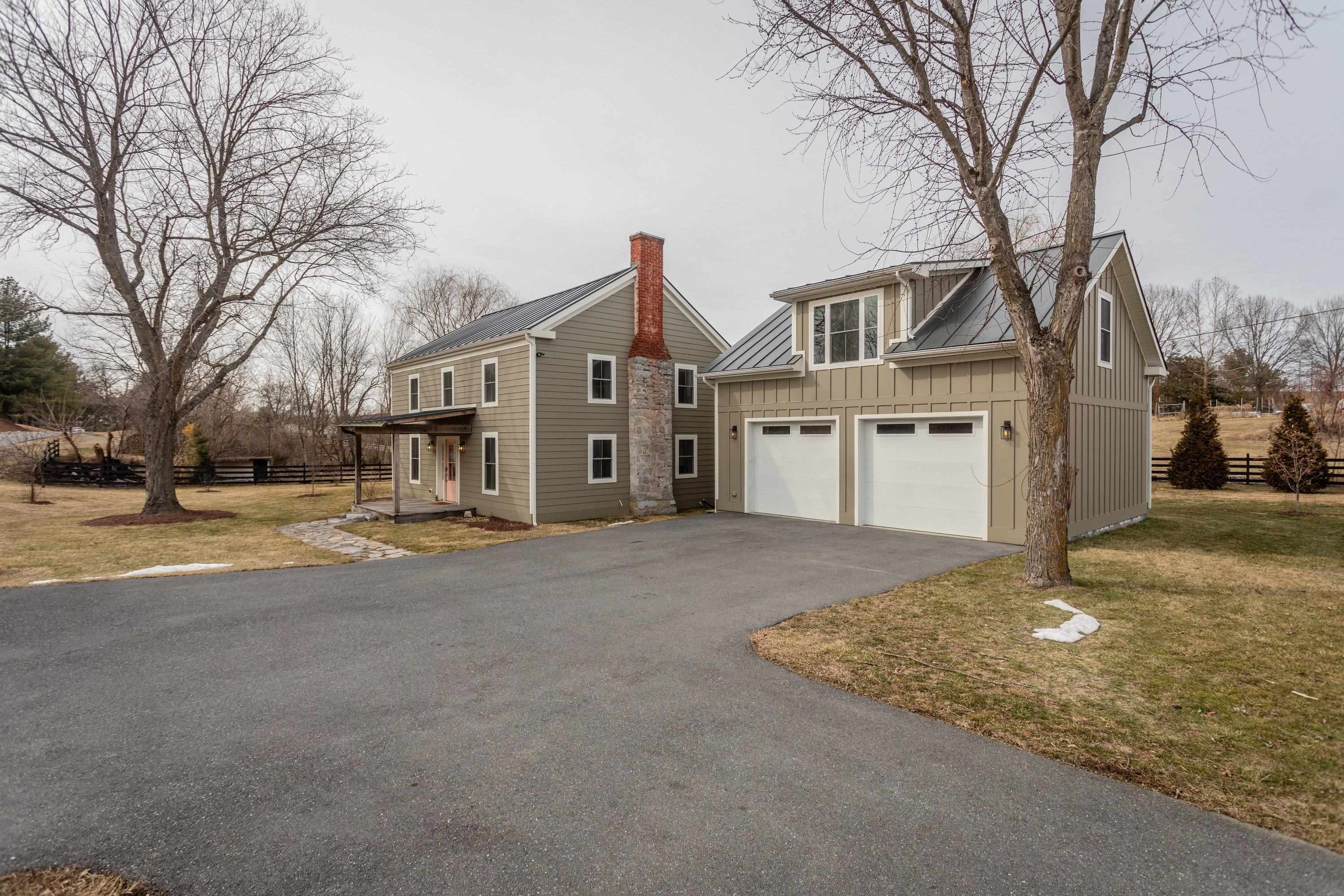 2862 Osceola Springs Road Harrisonburg, VA 22801 - Photo 59 of 75 a front view of a house with a yard and garage