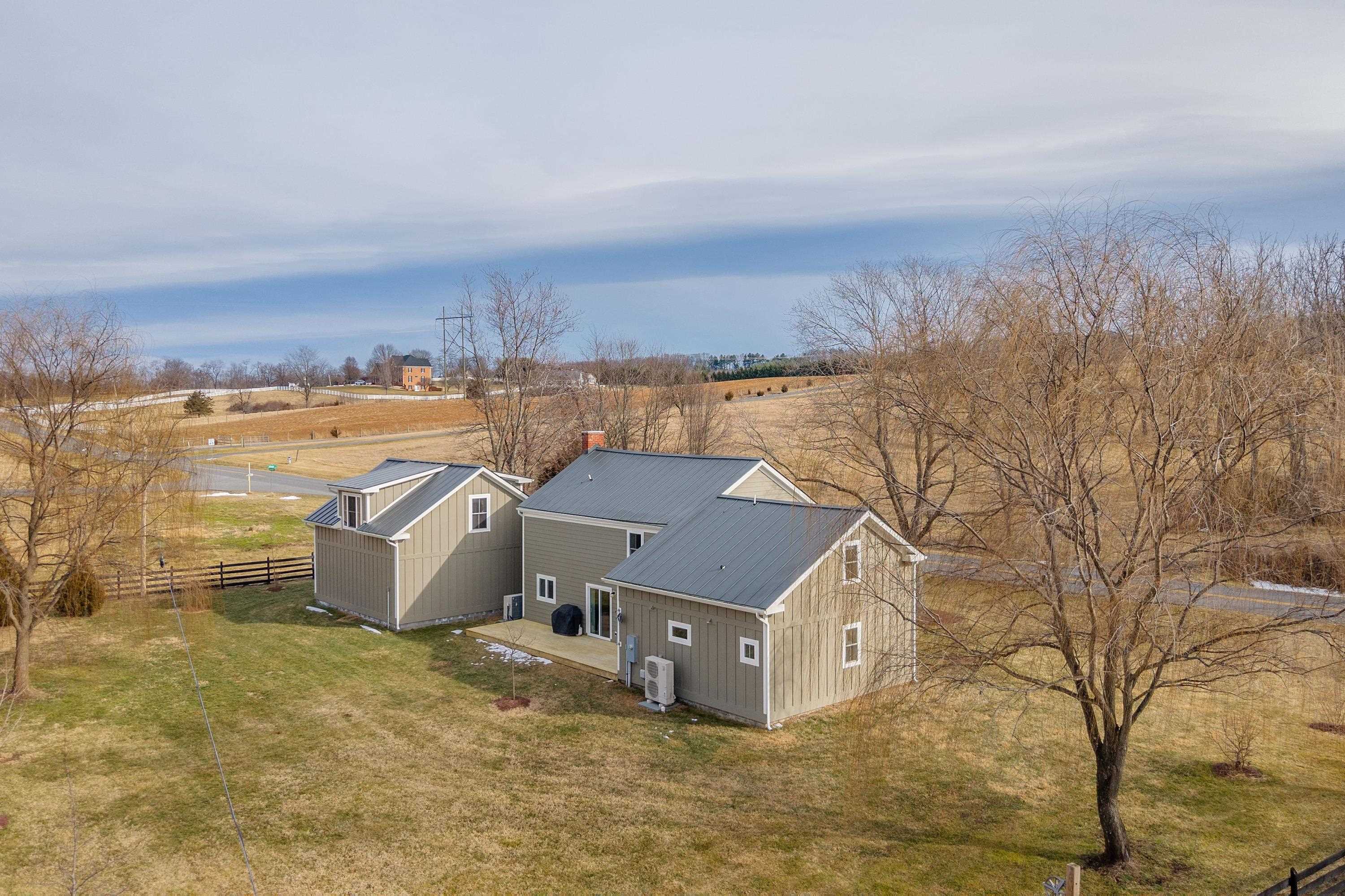 2862 Osceola Springs Road Harrisonburg, VA 22801 - Photo 68 of 75 an aerial view of a house with a yard and lake view