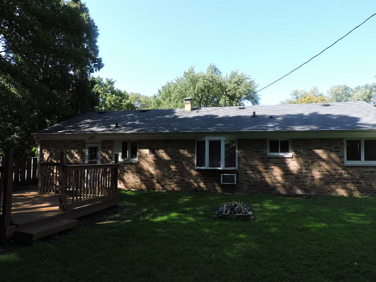 4219 Ostrander Road Rockford, IL 61107 - Photo 16 of 16 a view of house with a yard