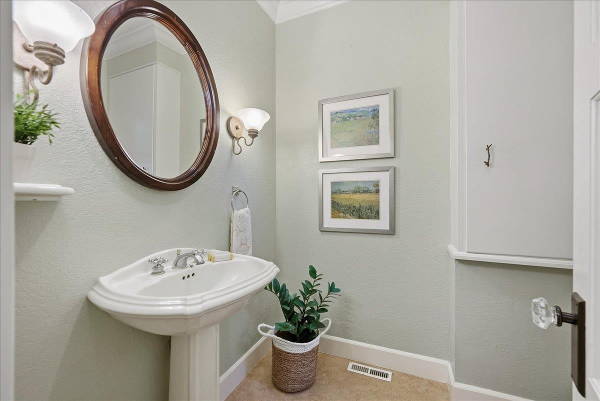 43120 Montgomery Avenue Davis, CA 95618 - Photo 20 of 52 a bathroom with a sink and a mirror