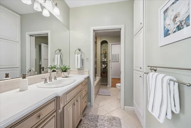 a bathroom with a shower and a toilet