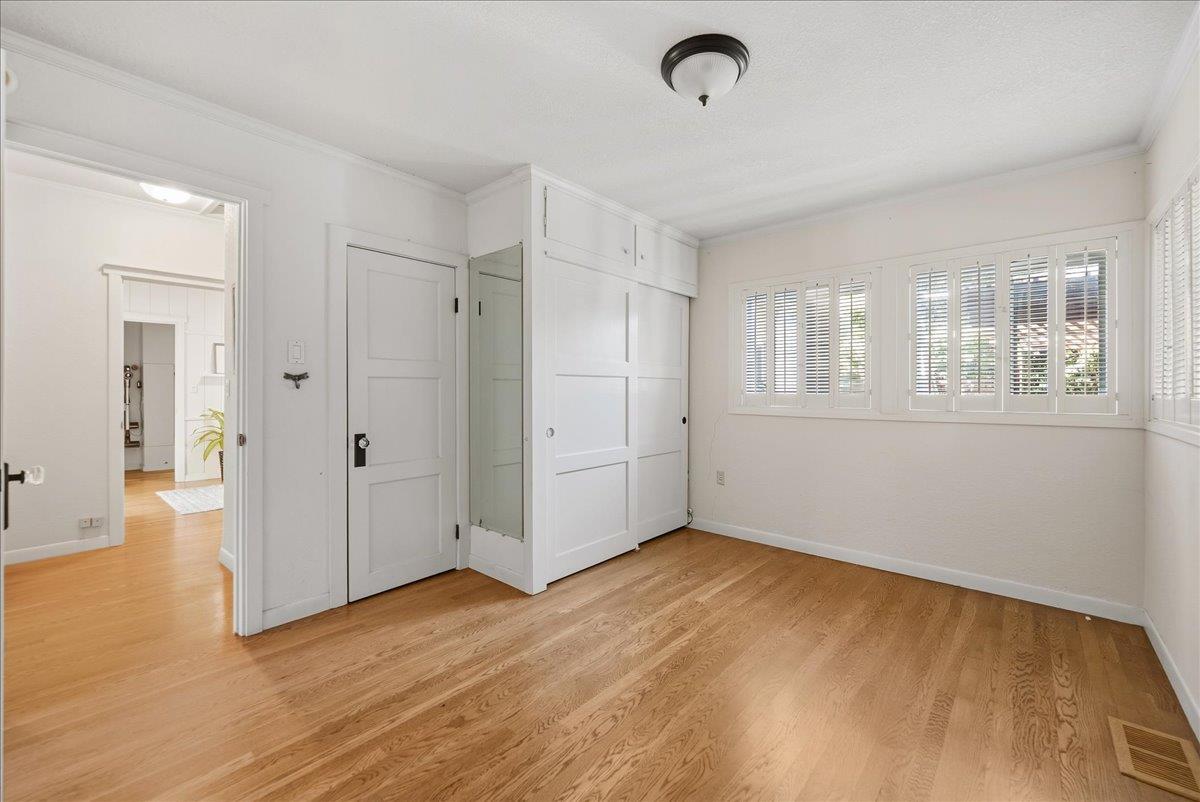 43120 Montgomery Avenue Davis, CA 95618 - Photo 26 of 52 a view of an empty room with wooden floor and a window