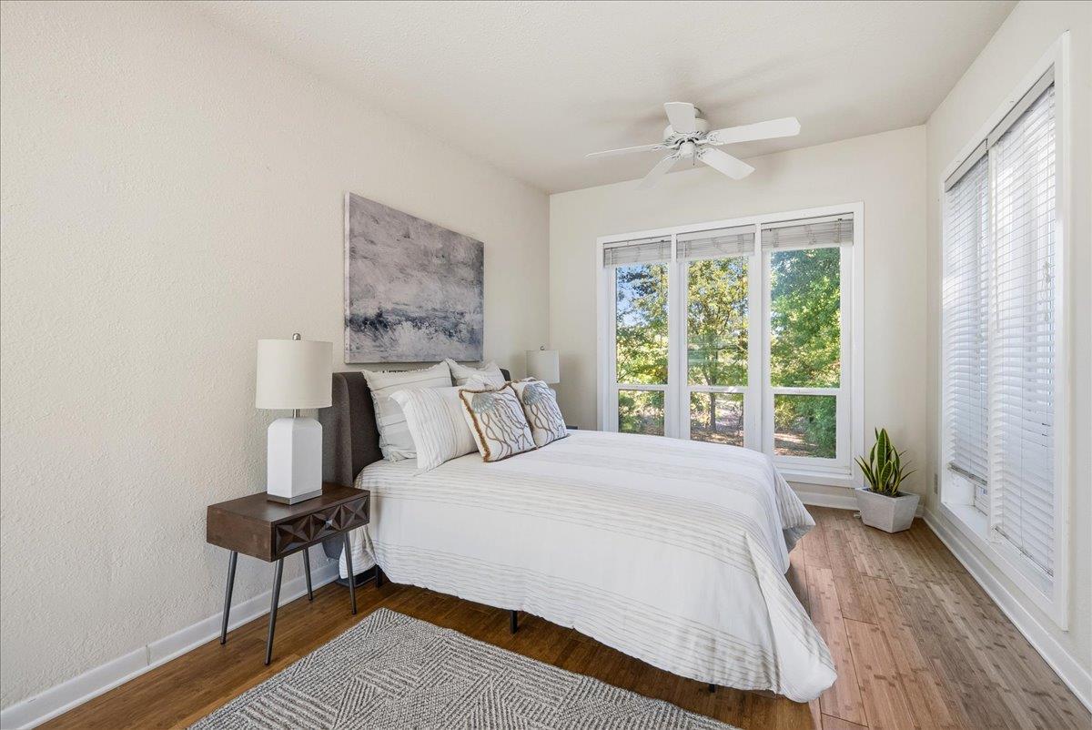 43120 Montgomery Avenue Davis, CA 95618 - Photo 38 of 52 a large bed sitting in a bedroom next to a window