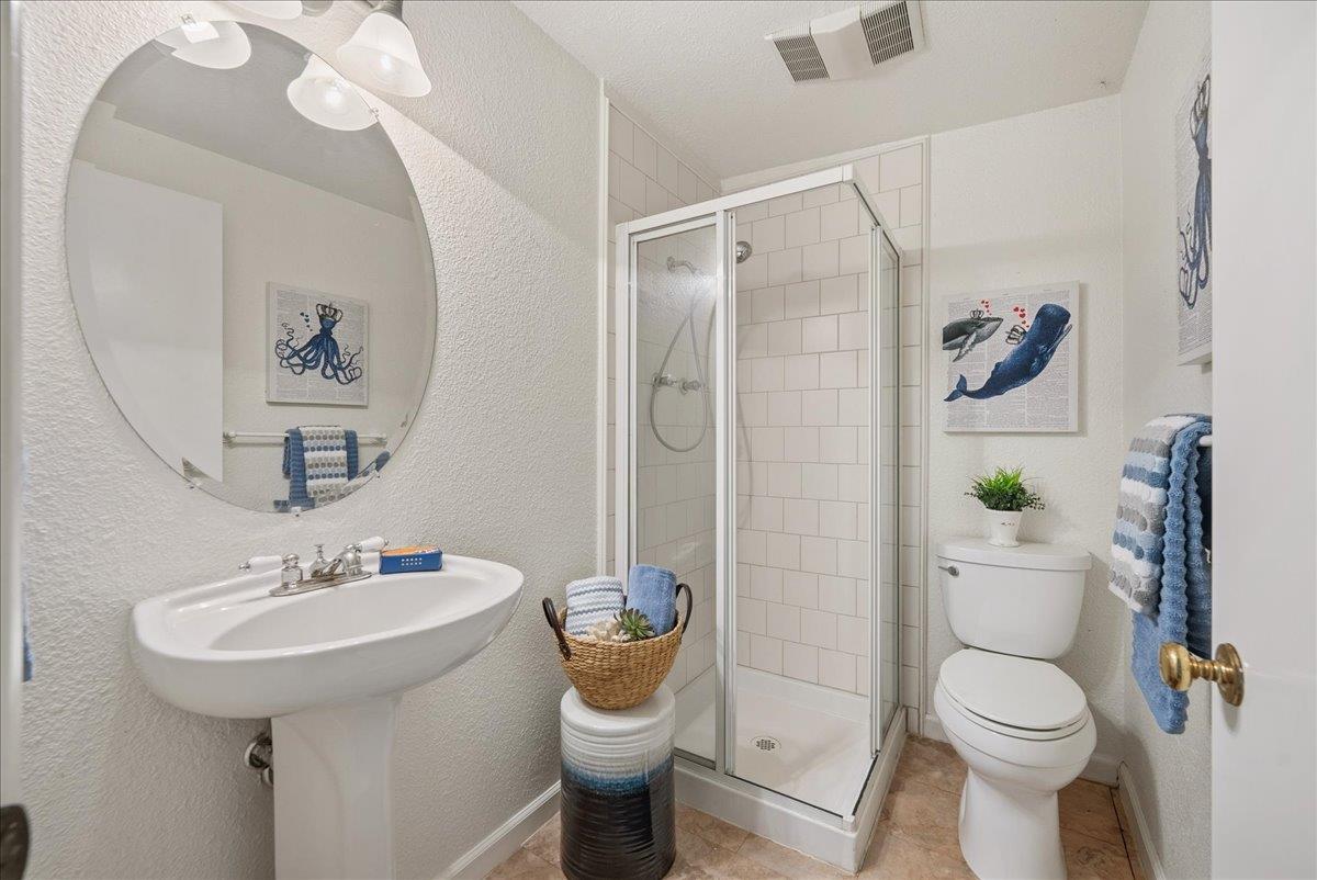 43120 Montgomery Avenue Davis, CA 95618 - Photo 39 of 52 a bathroom with a sink toilet and shower