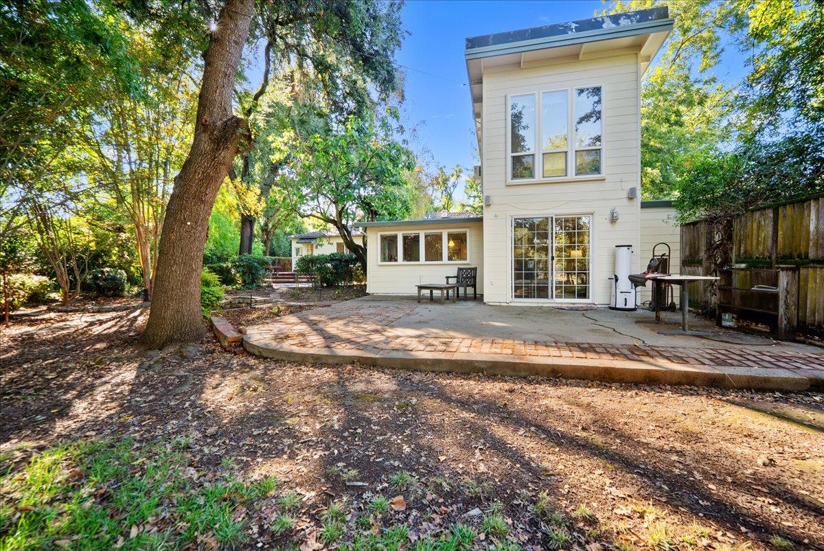 43120 Montgomery Avenue Davis, CA 95618 - Photo 46 of 52 a view of a house with backyard and trees
