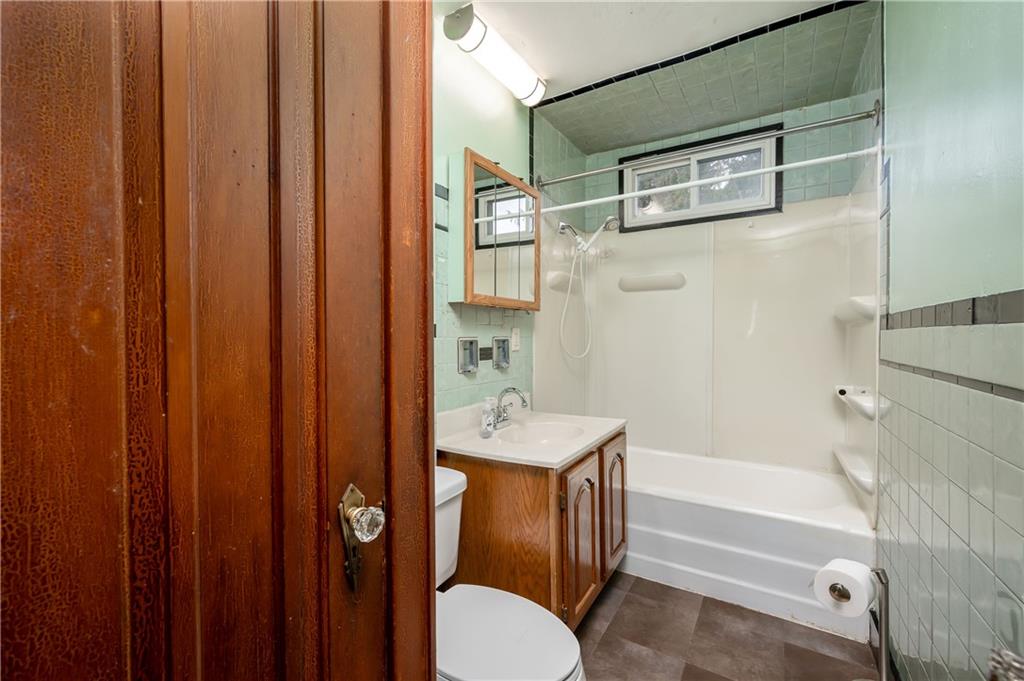 117 Freeport Road Butler, PA 16002 - Photo 12 of 25 a bathroom with a sink and a mirror